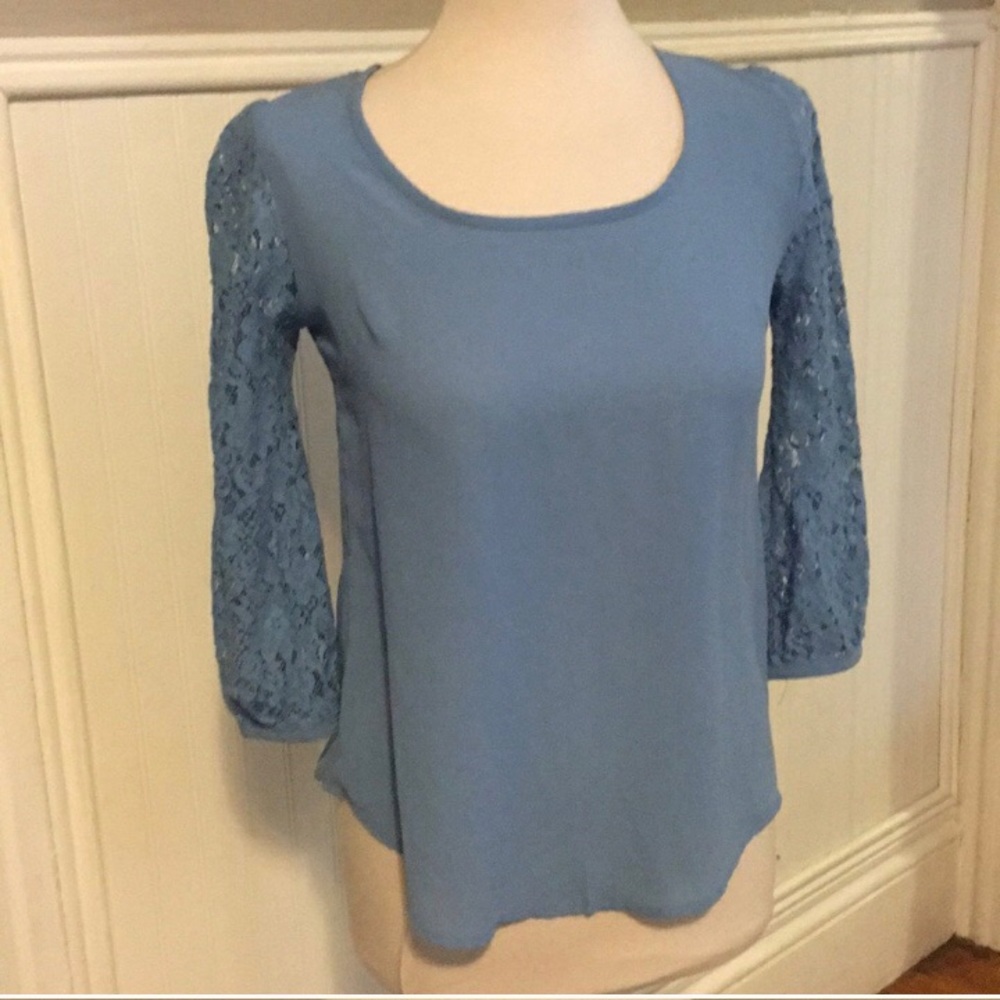 Baby Blue Top with cute bows down the back